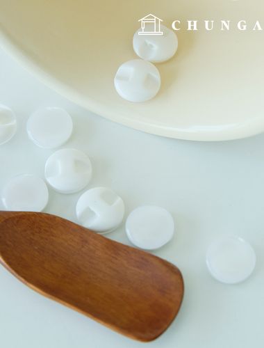 プラスチックサークルオーロラホワイトボタン服を作る