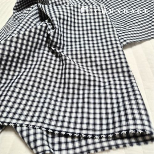 ポリ生地ナイロンスパン生活防水チェック生地ブラックスクエア1cm